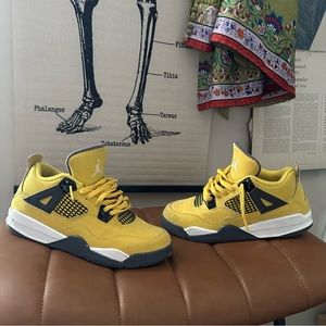 yellow and black lighting jordan 4s